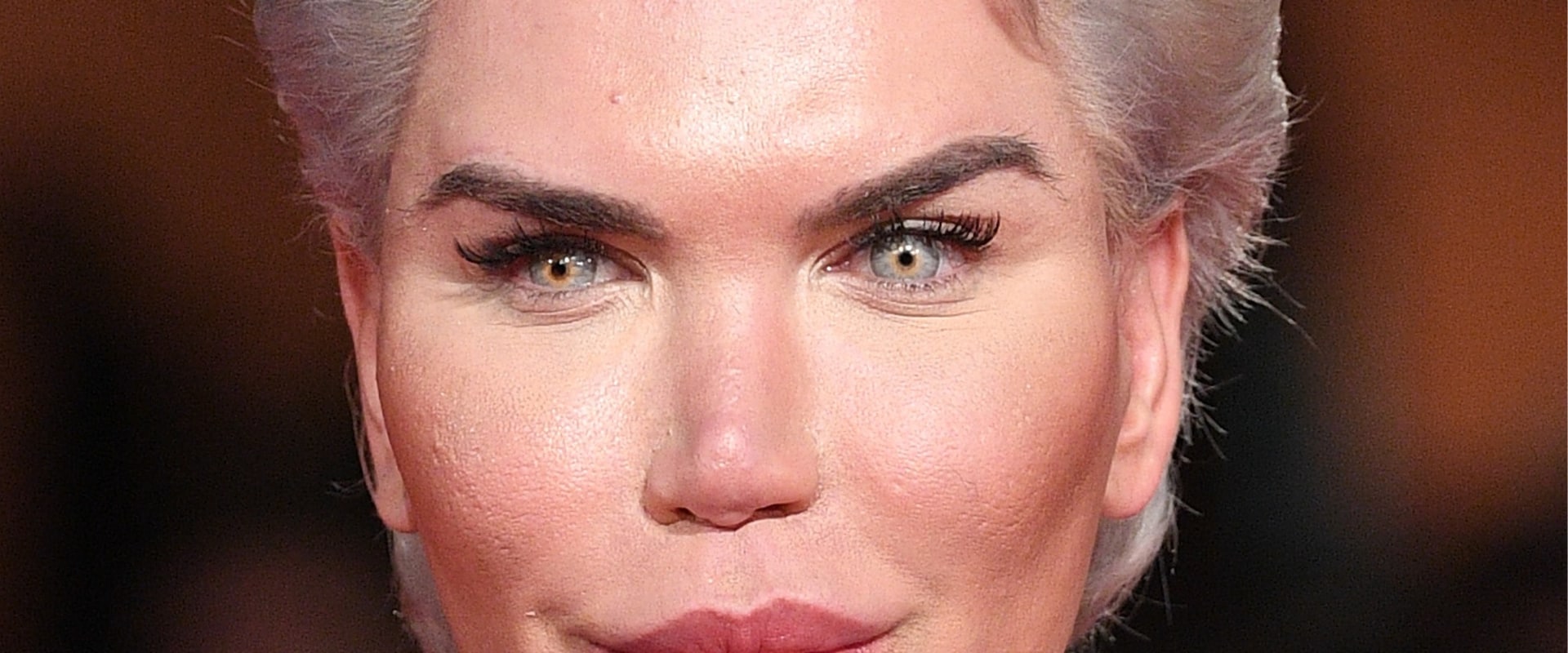 How many people are satisfied with plastic surgery?
