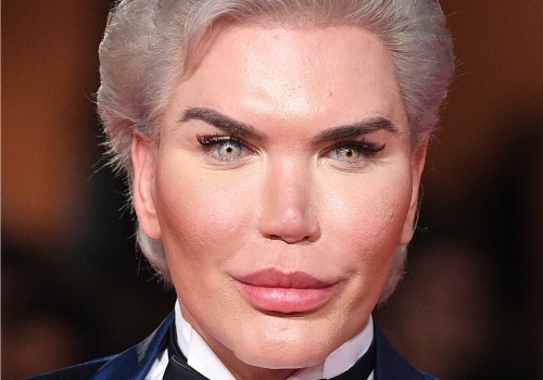 How many people are satisfied with plastic surgery?